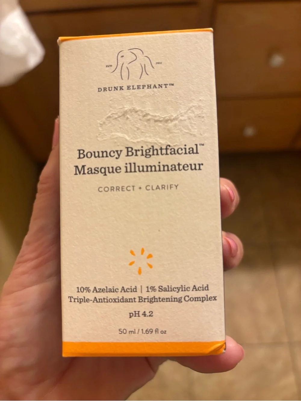 Drunk Elephant White Box with Orange Accents Bouncy Brightfacial Masque